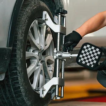 Wheel alignment being performed at Skeeter's Auto Service in Cypress, TX